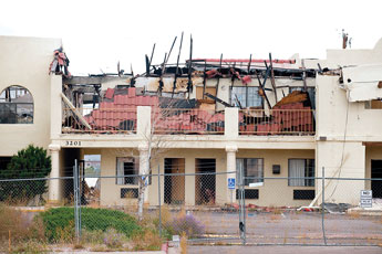 The Days Inn, 3201 W. Highway 66 burned down in January 2010. Now mired in lawsuits and civil technicalities, it sits as an eyesore. &copy; 2011 Gallup Independent / Brian Leddy 